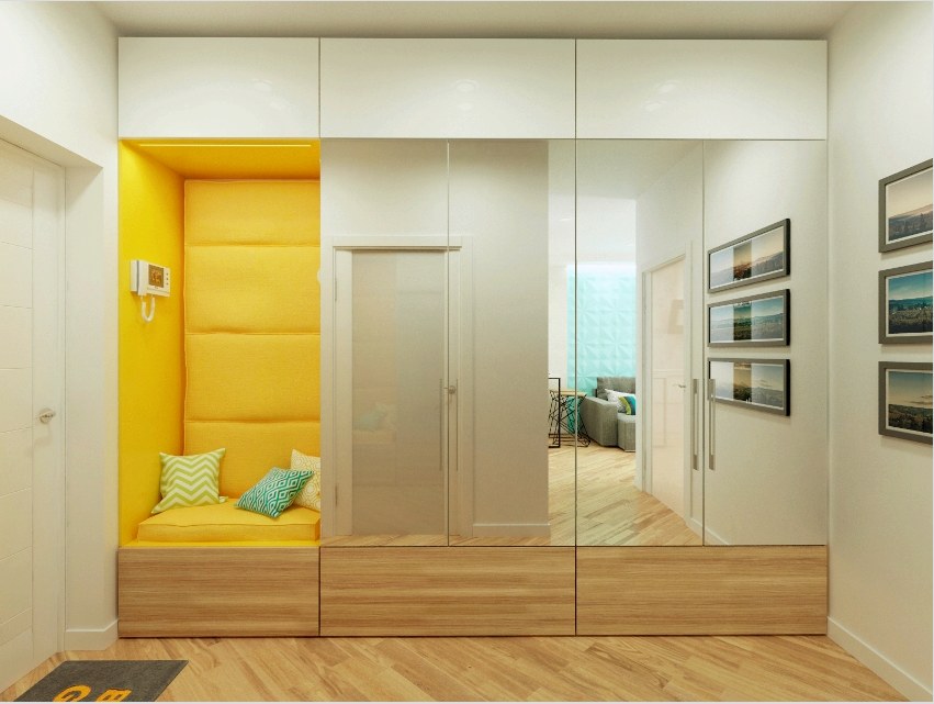 A világos árnyalatok nemcsak vizuálisan nagyítanak egy kis helyiséget, hanem könnyítést, tisztaságot és eleganciát adnak a folyosó belső oldalán.