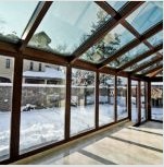Panorámás ablakokkal ellátott ház: fotópéldák a gyönyörű francia üvegezésről