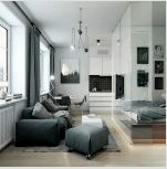 A lakás belseje egyszerű és ízléses: a szobák visszapillantott stílusú kialakításának fotója