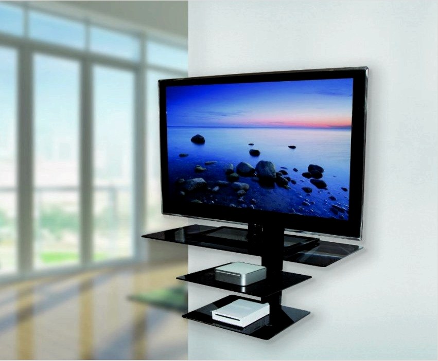 A polcokkal felszerelt kar lehetővé teszi a távirányító, a lemezek és más elemek elhelyezését a TV közelében