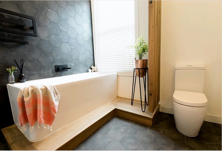 A fürdőszoba skandináv stílusú befejezéséhez kívánatos természetes fa és kő használata
