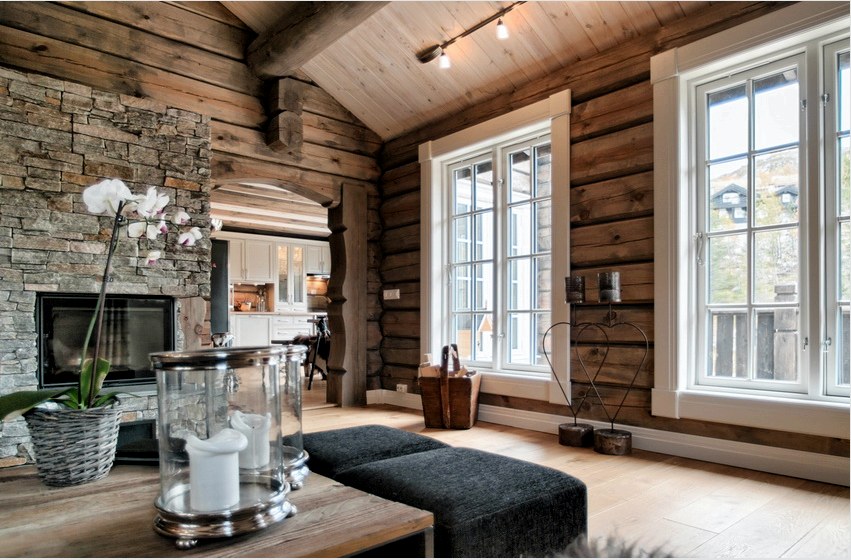 Fából vagy rönkből készült házakban a belsőépítészet népszerű lehetősége minimális dekorációval