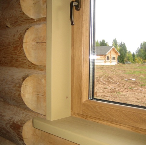 Ablakkeretek telepítése egy faházba