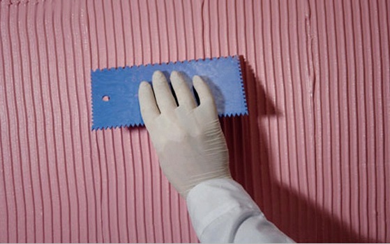 A lakások falainak texturált vakolása: tervezési befejező technológia