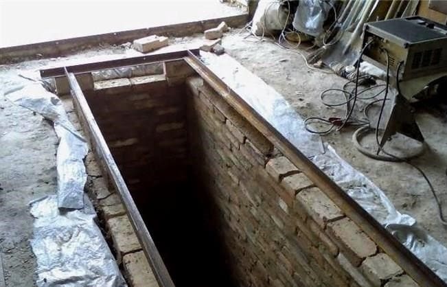 Vízszigetelés egy beton ellenőrző gödör - hogyan lehet megszabadulni a talajvíztől egy garázsban