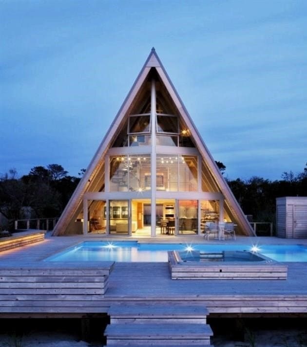 Kunyhó formájában épült ház - eredeti ötlet egy nyári rezidenciához