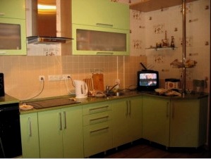 A falak díszítése a konyhában (30 fotó): kerámia burkolólapok, festmények, tapéták, dekoratív vakolatok és egyéb felületek, köténydíszítés
